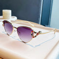 Gilt Serpent Cat-Eye Sunglasses