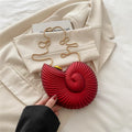 Spiral Gleam Conch Clutch