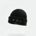 Nightshift Studio Cross‑Ring Pierced Beanie