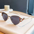 Gilt Serpent Cat-Eye Sunglasses