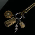 Multi‑charm horseshoe‑clasp necklace