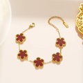 Fortuna's Favor: Five-Leaf Clover Charm Bracelet